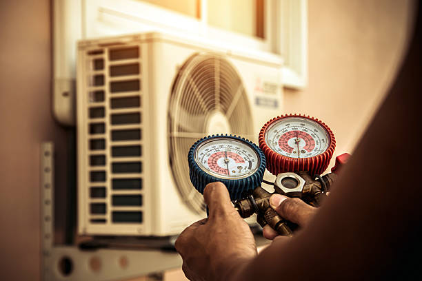 Professional Heat Pump Repair technician working in Moscow, TN